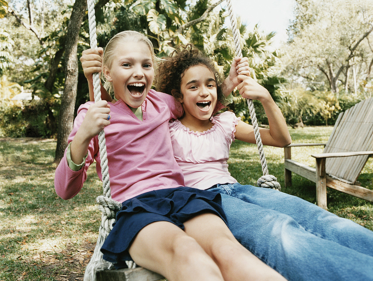 Girls on a swing